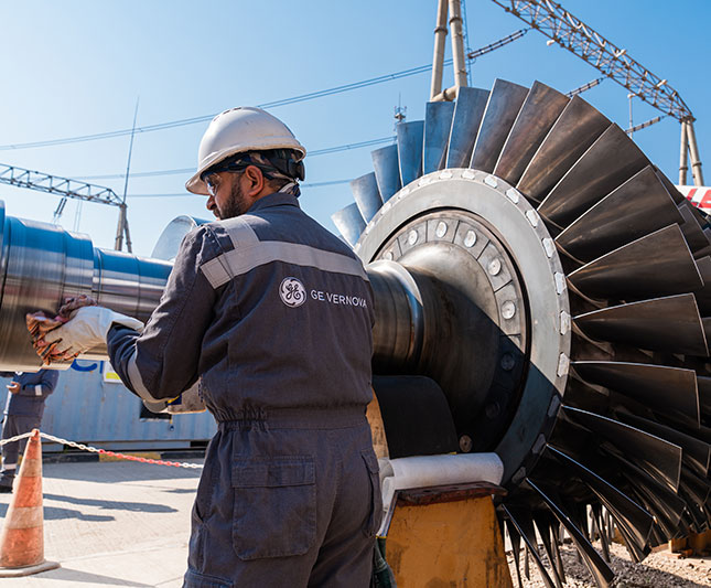 person working on machinery